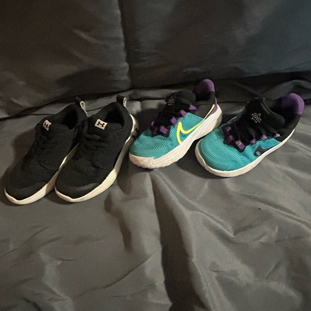 Toddler size 7.5 Nike sneakers; Toddler size 8 Under Armor sneakers